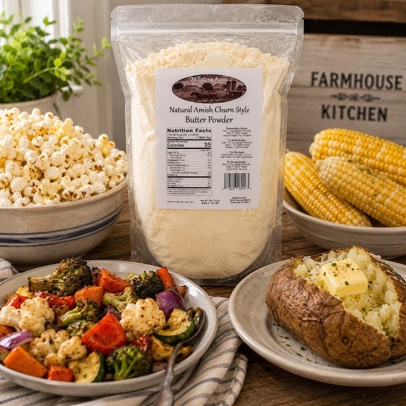 Millstone Acres Natural Salted Butter Powder displayed with buttered popcorn, roasted vegetables, sweet corn on the cob, and a baked potato in a bright farmhouse kitchen.