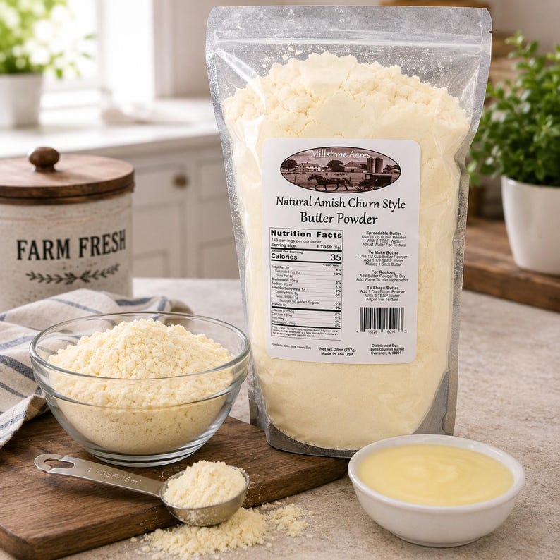 Millstone Acres Natural Salted Butter Powder displayed with a bowl of butter powder, measuring scoop, and prepared butter in a bright farmhouse kitchen.