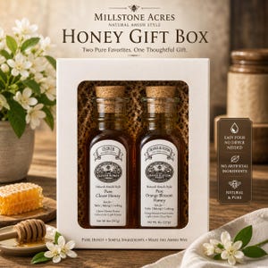 May include: A honey gift box featuring two bottles of honey with cork stoppers. One bottle is labeled "Clover Honey" and the other "Orange Blossom Honey." The box includes text that reads "Pure Honey, Simple Ingredients, Made the Amish Way."