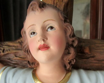 Infant Child Jesus on the Cross . Religious statue Jesus Christ  of the 50s. Santos Olot Antique Vintage