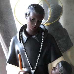 Saint Martin de Porres, saint of the broom. religious figure