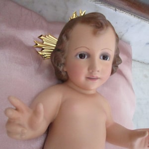 Antique Baby Infant Child Jesus with glass eyes. Religious figure made of plaster dated 1950