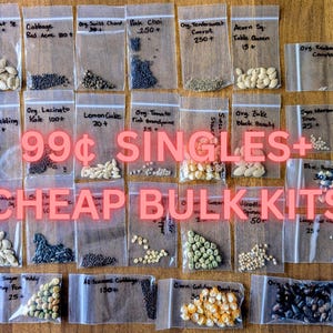 May include: A collection of clear plastic resealable bags containing various types of vegetable and flower seeds. Each bag is labeled with handwritten text identifying the seed variety and quantity, with the text 99¢ SINGLES+ CHEAP BULK KITS overlaid.