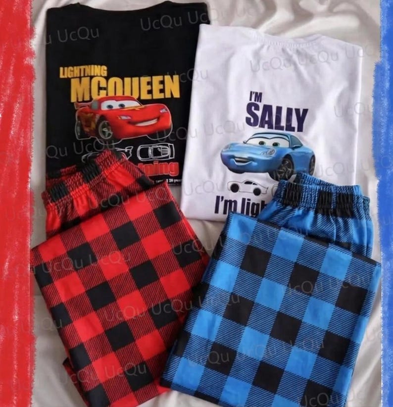May include: A black t-shirt with a red car graphic and the text Lightning McQueen, a white t-shirt with a blue car graphic and the text I'm Sally, red and black plaid pajama pants, and blue and black plaid pajama pants with an elastic waistband.