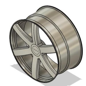 May include: A silver-colored alloy wheel with a multi-spoke design. The wheel features the brand name "NISSAN" in the center. The wheel is designed for a vehicle and is shown at an angle, casting a shadow.