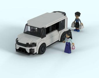 May include: A white toy SUV with black wheels and windows. Two miniature figures are standing near the vehicle. One figure is carrying shopping bags, and the other is holding a purse. The figures are wearing casual clothing.