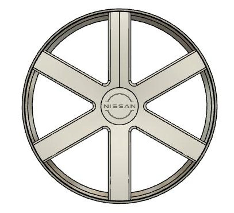 May include: A silver-colored car wheel with a six-spoke design. The wheel has a circular center with the "NISSAN" logo. The outer rim is a darker shade of silver, creating a contrast.