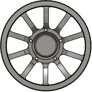 May include: A gray, stylized wheel with a circular design. The wheel features multiple spokes radiating from a central hub, with a series of small circular details around the hub. The outer rim is a darker gray, creating a defined edge.