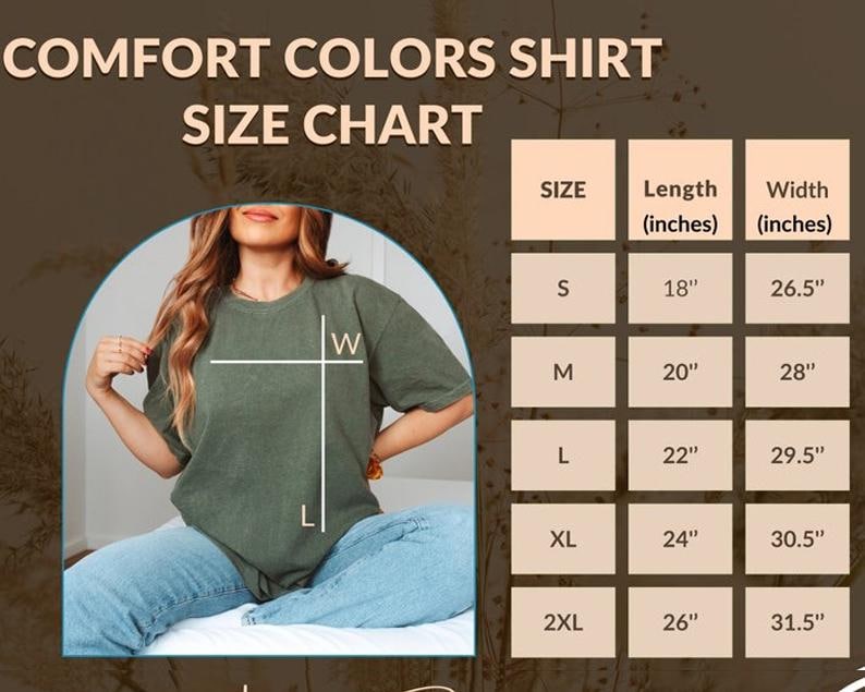 May include: Olive green Comfort Colors shirt with a size chart. The chart shows shirt sizes S to 2XL, with lengths from 18 inches to 26 inches, and widths from 26.5 inches to 31.5 inches.