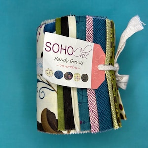May include: A bundle of fabric strips in a variety of patterns and colours, including floral, geometric, and striped designs. The fabric is tied with a white ribbon and a tag that reads "SOHO Chic" by Sandy Gervais.
