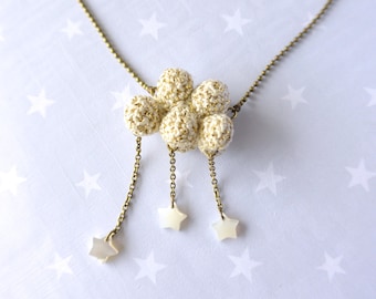 Necklace crochet Cloud with snow. Star cloud. Winter cloud