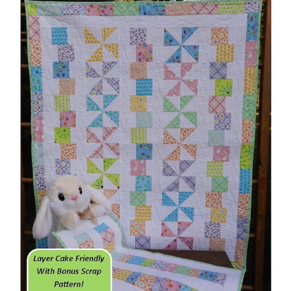 Può includere: Un modello di trapunta per neonati chiamato "Tumbles & Twirls Baby Quilt" con uno sfondo bianco, quadrati colorati e un design fantasioso. La trapunta è realizzata con tessuti di "Frolic" di Me & My Sister for Moda. Il modello è compatibile con i layer cake e include un modello di scarti aggiuntivo. Puoi realizzare due trapunte da un solo pacchetto.