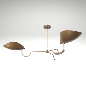 May include: A white ceramic mug with a black handle and the text "But First, Coffee" in a handwritten style. The mug is on a white surface. The mug is approximately 10 cm tall.