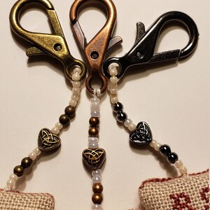 Metallic bead options (from right to left): Antique Gold, Rose Gold, and Black Tungsten.