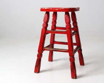 vintage red wooden stool