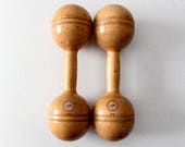 antique dumbbell pair by Narragansett Machine Co., wood weights