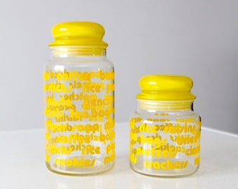 vintage glass kitchen canisters, yellow canisters with writing