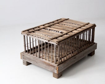 vintage farm cage, rustic wooden coffee table, wood crate