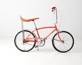 The Schwinn StingRay circa 1972 - orange saddle seat bicycle