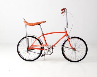 The Schwinn StingRay circa 1972 - orange saddle seat bicycle