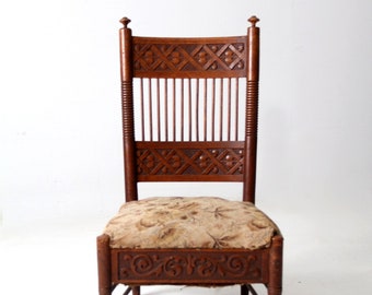 antique Norwegian carved low seat chair with upholstery