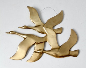 mid-century brass bird sculptural wall hanging