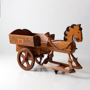 vintage folk art toy riding horse and cart