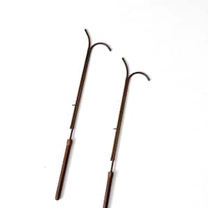 antique copper candle lighters, a pair