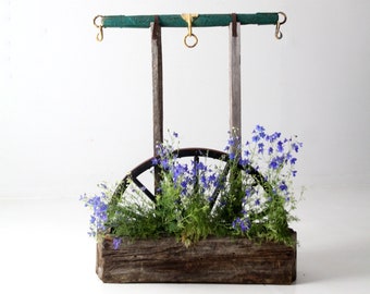 vintage folk art wagon wheel planter