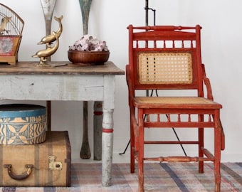 antique caned chair, red accent chair, turned wood chair