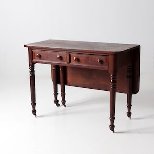 Craner turned store leg desk