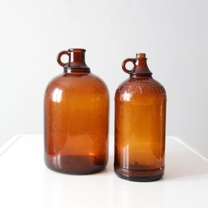 vintage brown glass bottles jugs pair