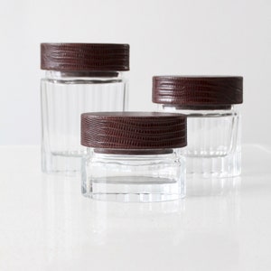 vintage cut glass jars with leather lids set/3