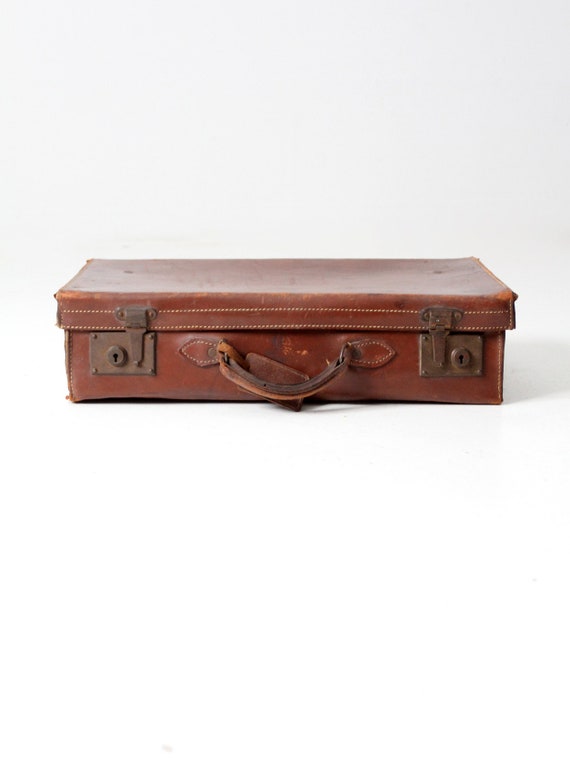antique leather suitcase with travel stickers - image 2