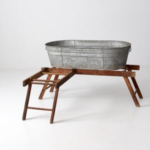 antique galvanized tub with wooden wash stand