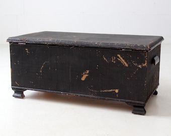 antique black woven canvas trunk
