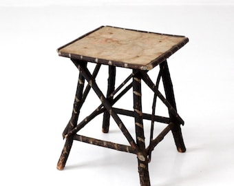 antique Adirondack twig table with floral cloth top