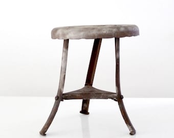 vintage milking stool with tripod legs