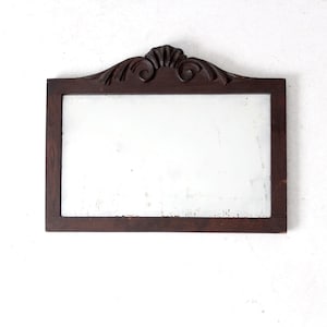 antique carved wood mirror