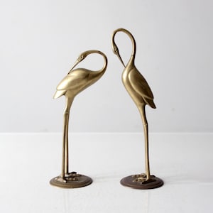 mid-century brass cranes pair