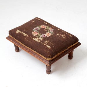 antique Victorian footstool with needlepoint upholstery