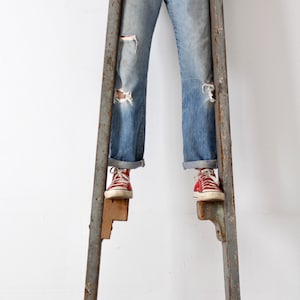 vintage wood stilts, primitive wooden stilts