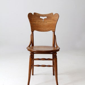 antique bentwood chair with cutout back