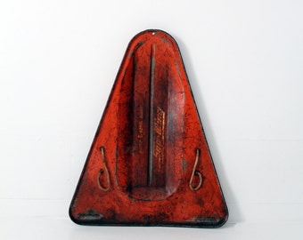 1960s Blazon Sno-Wing sled, red metal sled