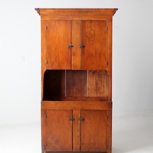 antique primitive cupboard