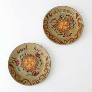 1950s Norwegian hand-painted wood plates pair