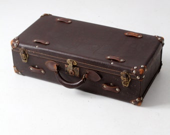 vintage brown leather suitcase