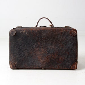 vintage distressed leather luggage