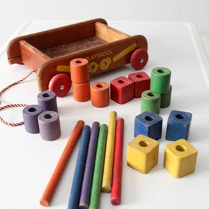 vintage 50s Playskool toy wagon with blocks
