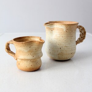 vintage studio pottery pitcher pair
